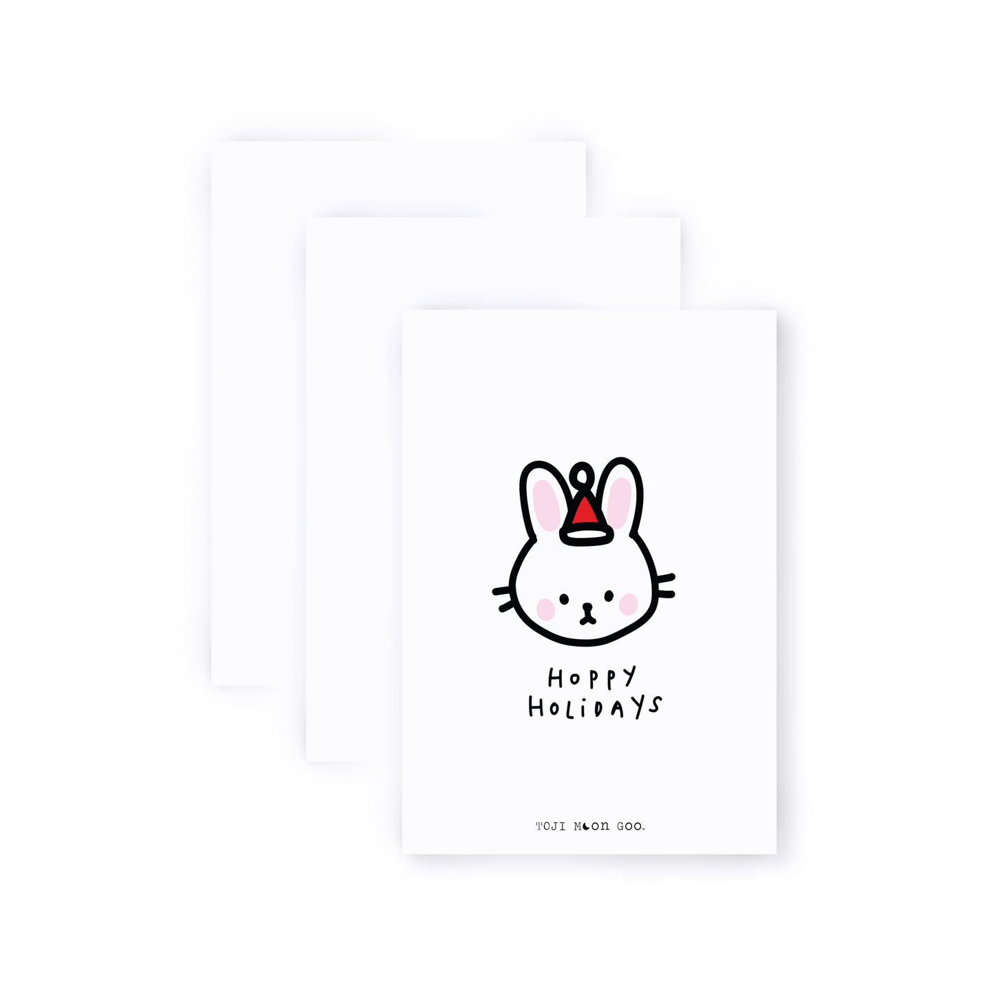 Trio Pack. White greeting card with minimal bunny doodle wearing red Santa hat. Card reads "Hoppy Holidays"