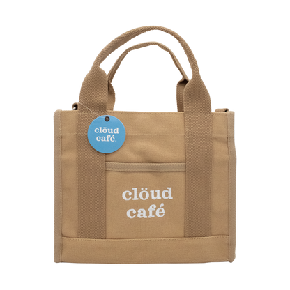 Front-facing brown canvas tote bag with embroidered "Clöud Café" logo text.